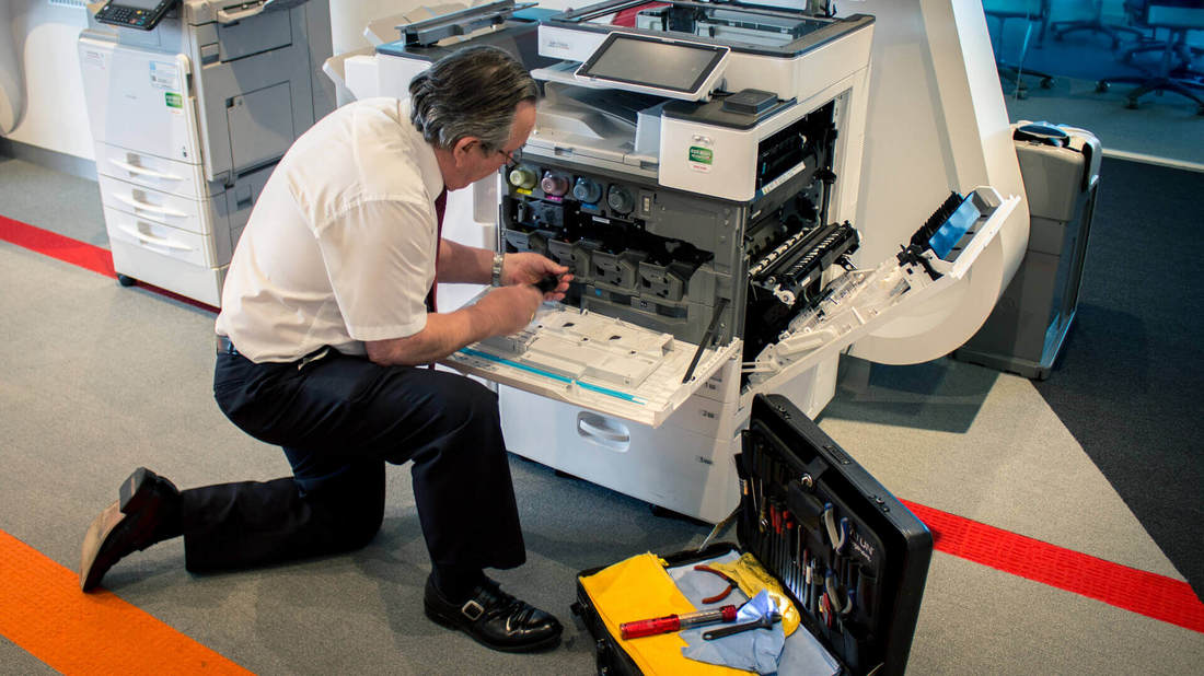 Repairing a photocopier - All Copy Products
